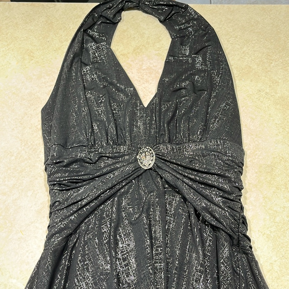 Maggy London knee length low cut dress. Size: women’s 10. Barely worn, like new.